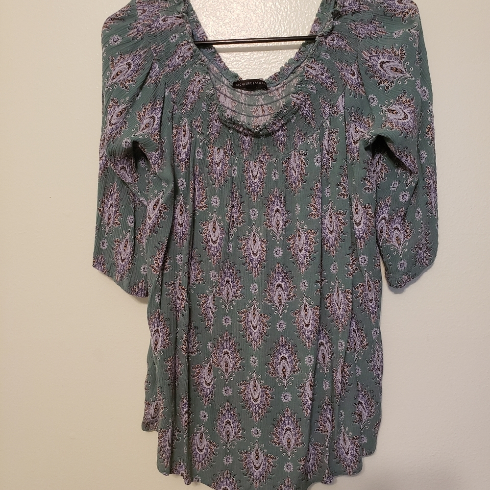 Teal green printed ladies blouse.